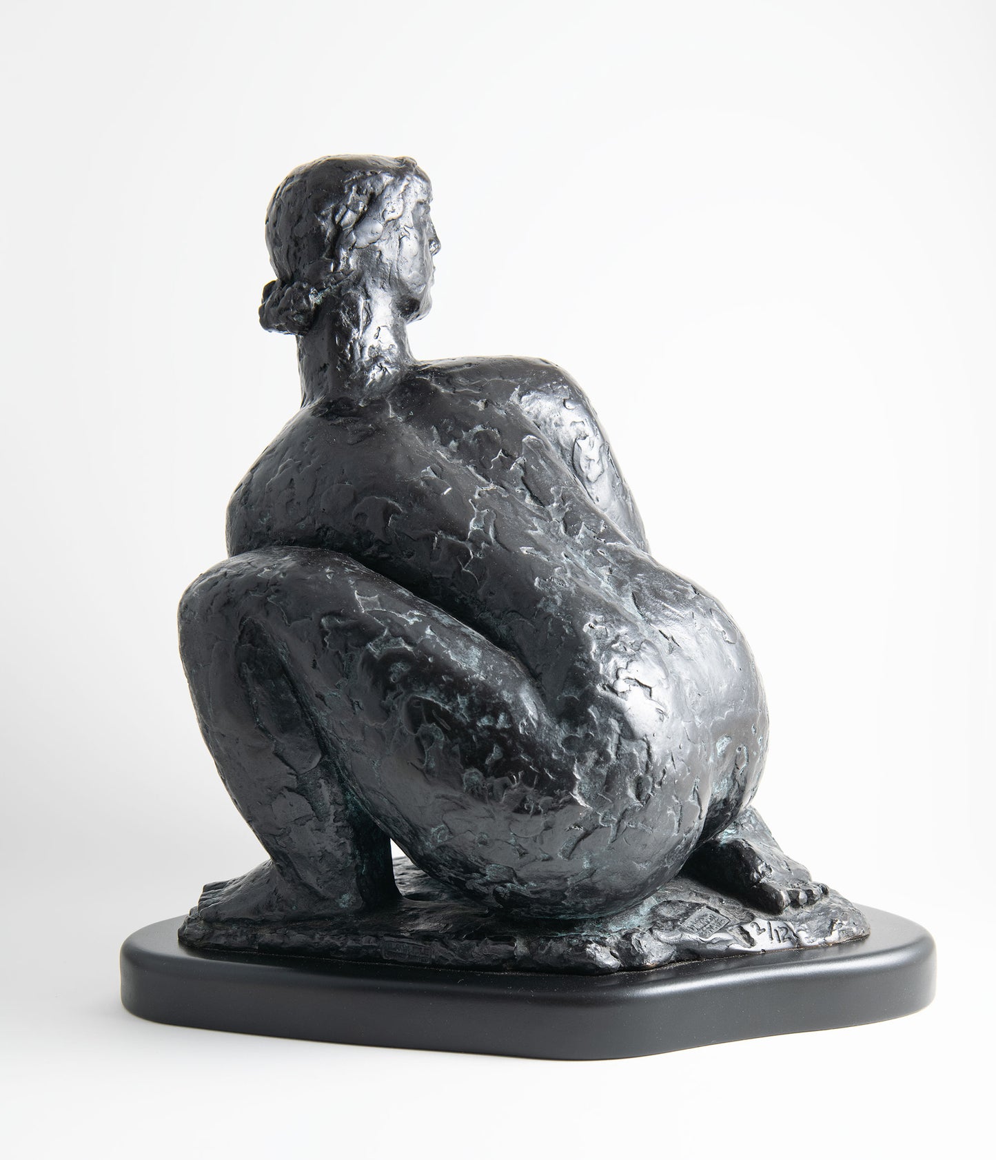 Squatting Female Figure with Pitcher