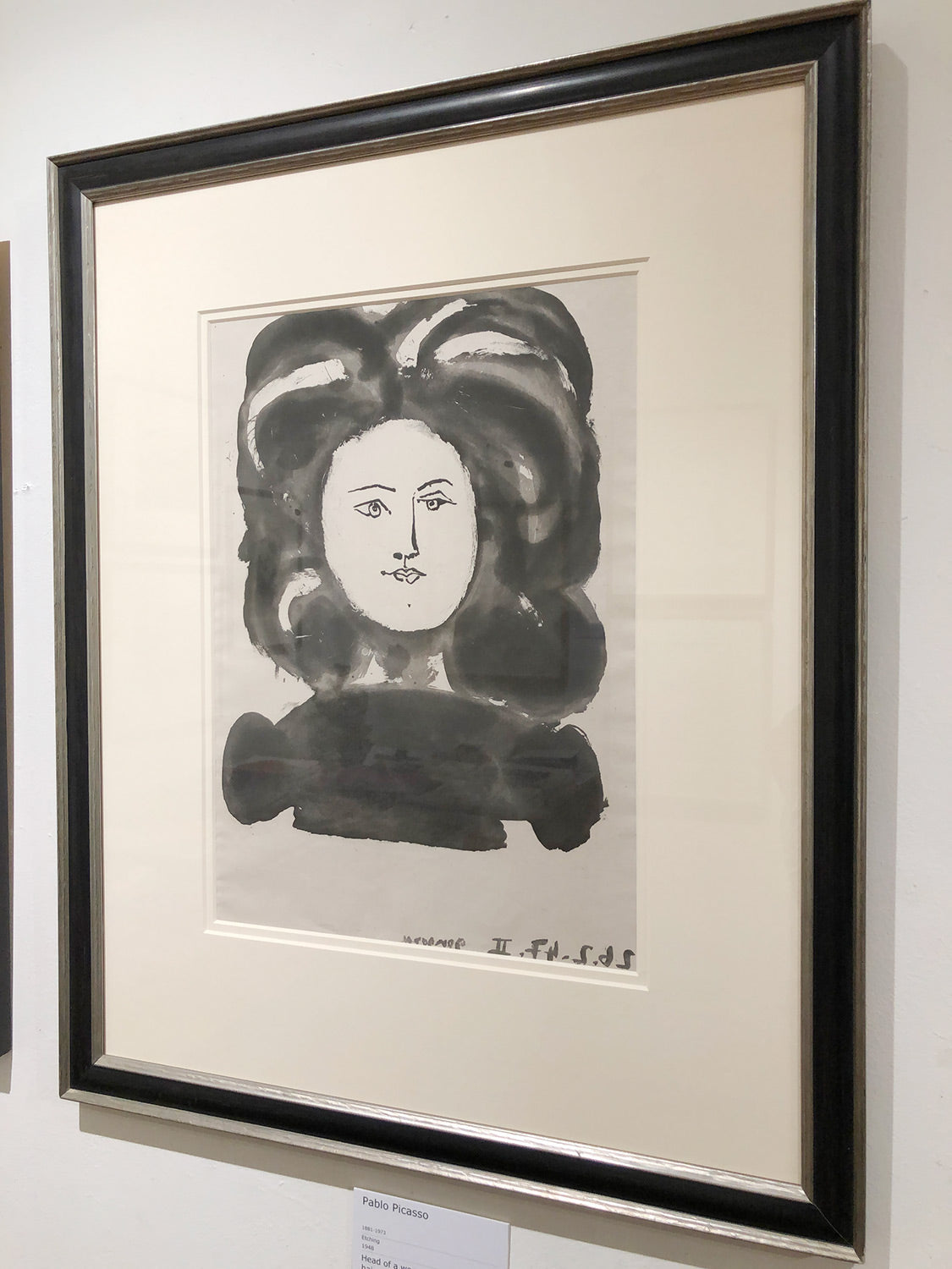 Head of a woman with ornamental hair style