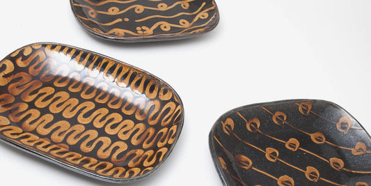 Doug Fitch slipware moulded platters for sale from Goldmark