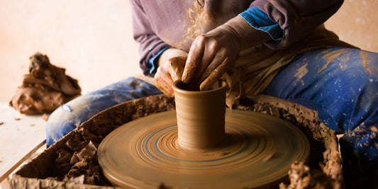 Jean Nicolas Gerard throwing tall beakers. Jean Nicolas Gerard pots for sale from Goldmark.