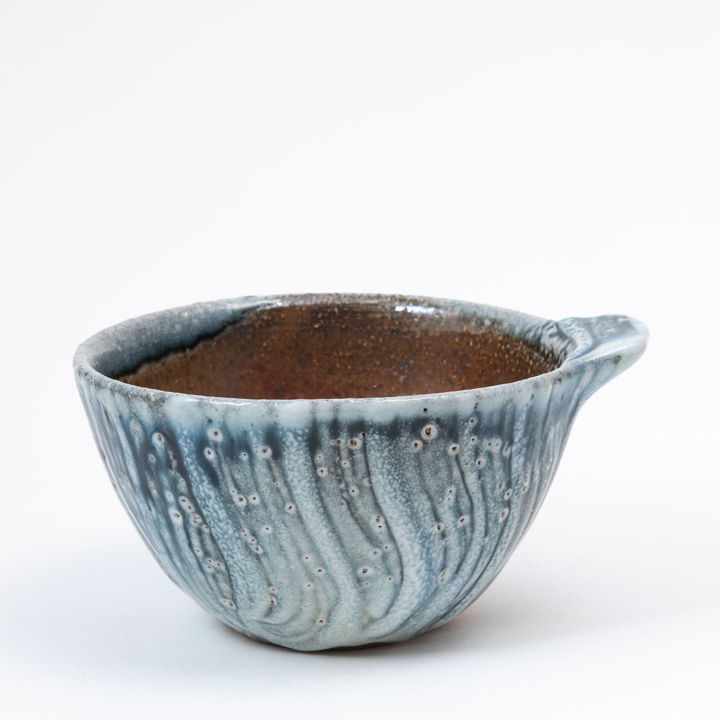 Set of Two Faceted Bowls With Lugs