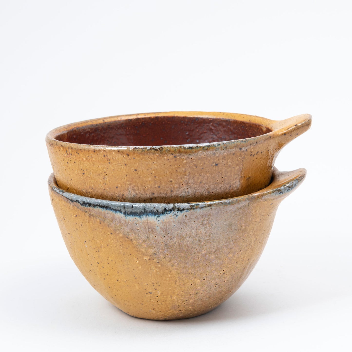 Set of Two Faceted Bowls With Lugs