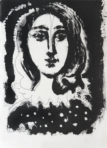 Face of a woman against a black ground