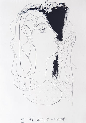 A woman looking at herself in a mirror