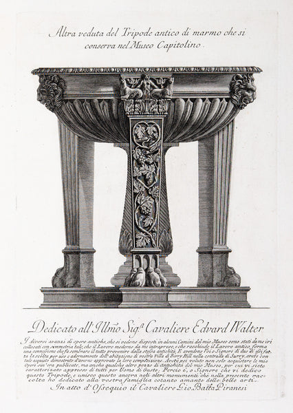 Marble tripod with vine leaves on the legs and spiral central support.